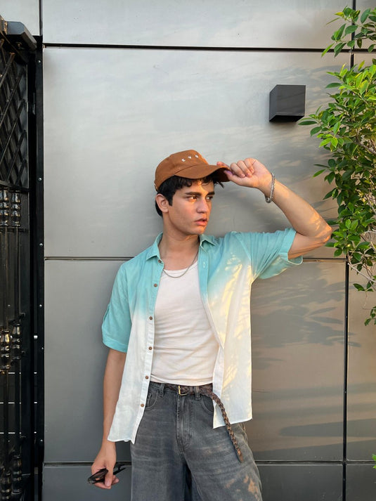 Men's teal half sleeve summer shirt with relaxed fit and resort collar