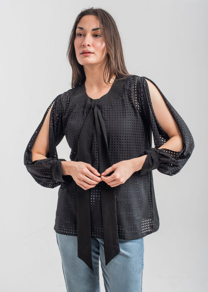 Women's formal top in black with laser cut details