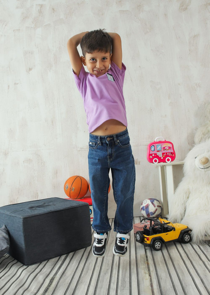 Boy's slim fit blue jeans with faded wash finish