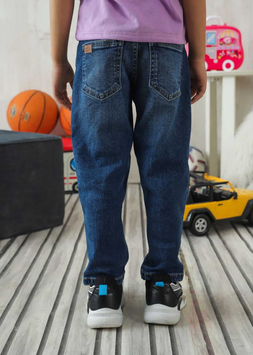 Boy's slim fit blue jeans with faded wash finish