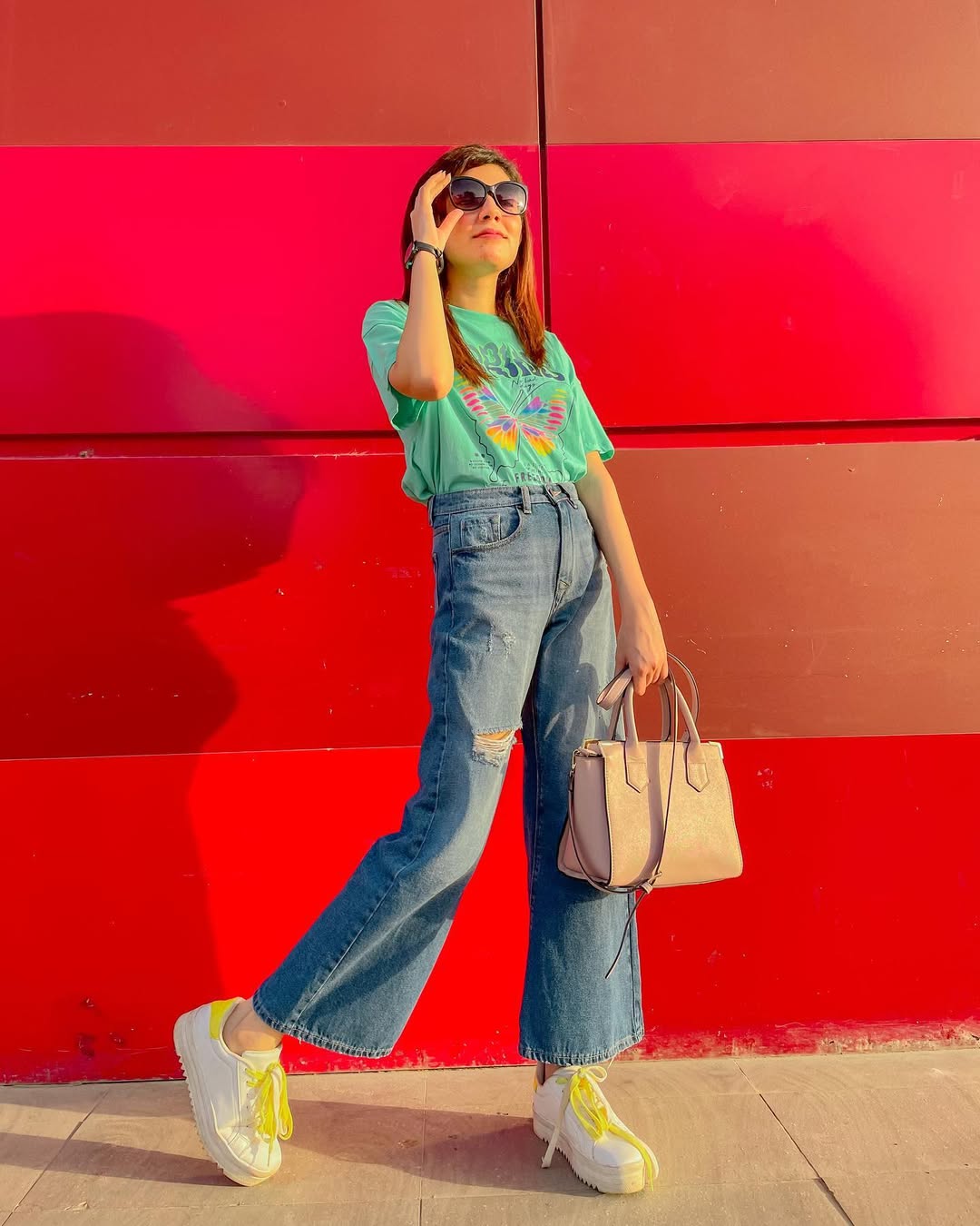 High-Waisted Women's Ripped Flare Jeans in Blue with a Straight-Style