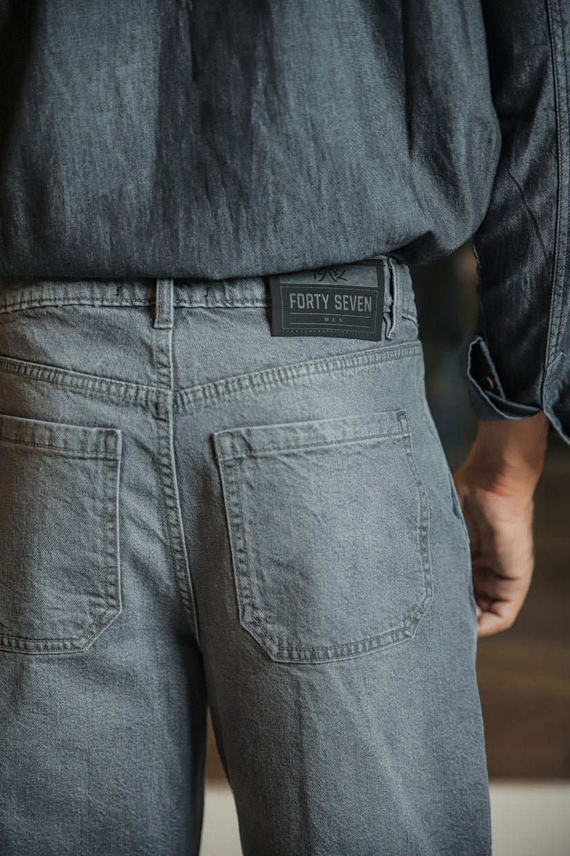 Grey pleated relaxed jeans men loose fit soft fabric tailored smart casual look