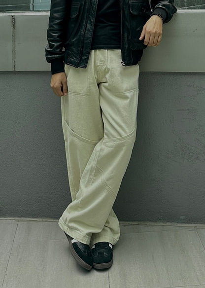 Beige patchline loose fit jeans men wide leg panel design modern streetwear look