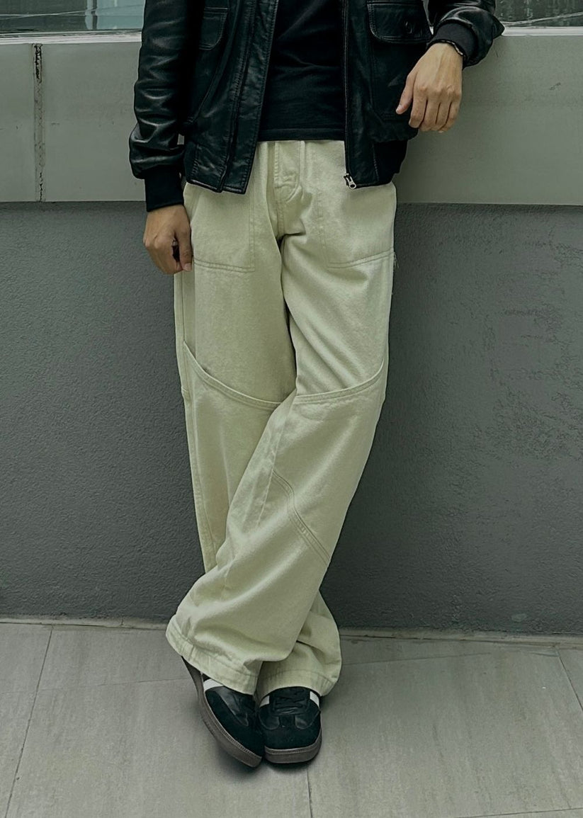 Beige patchline loose fit jeans men wide leg panel design modern streetwear look