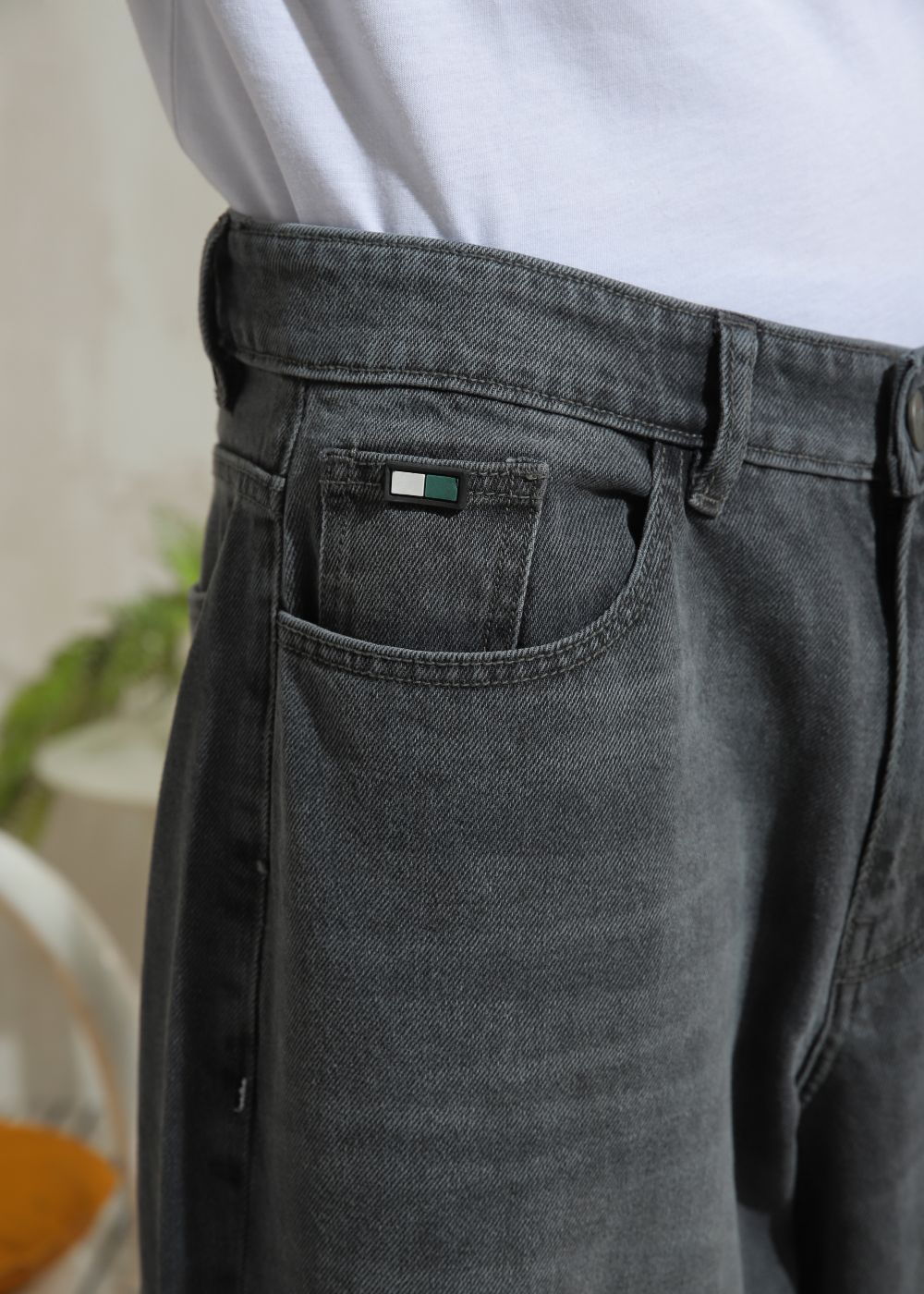 Men’s relaxed fit charcoal grey wide leg jeans with minimal detailing