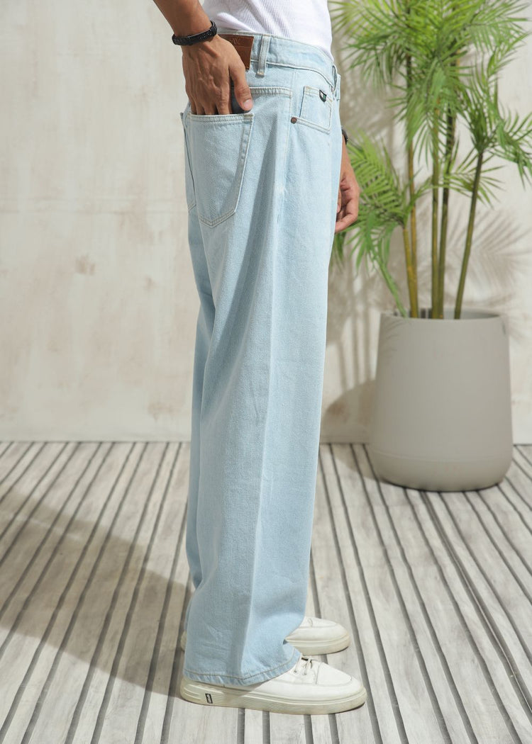 Men’s loose fit light wash blue wide leg jeans with clean finish
