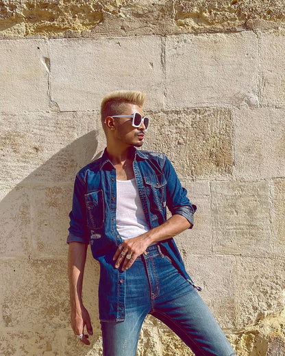 Men’s skinny fit dark blue ripped jeans with distressed knee detailing
