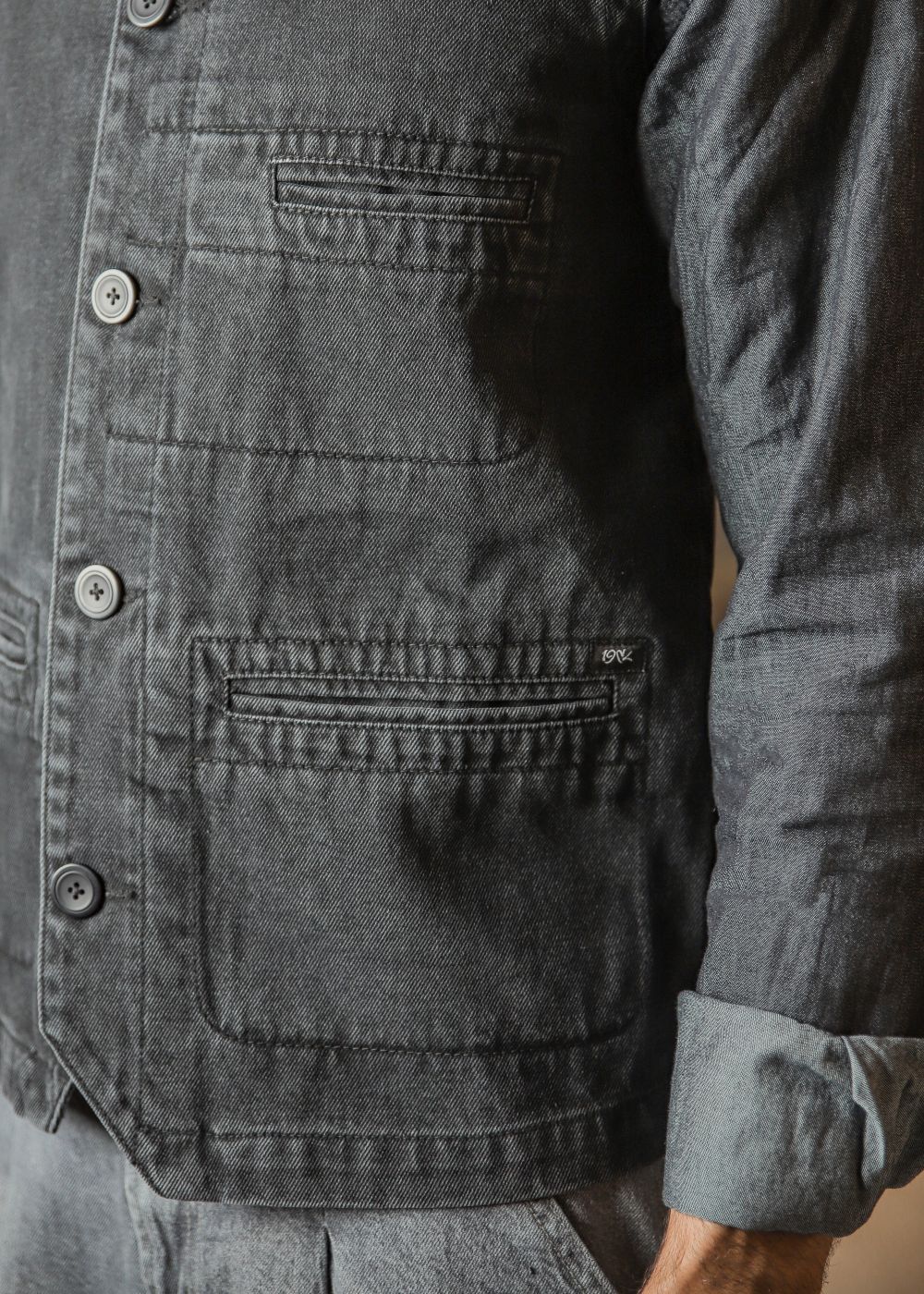 Men's black denim waistcoat with button front