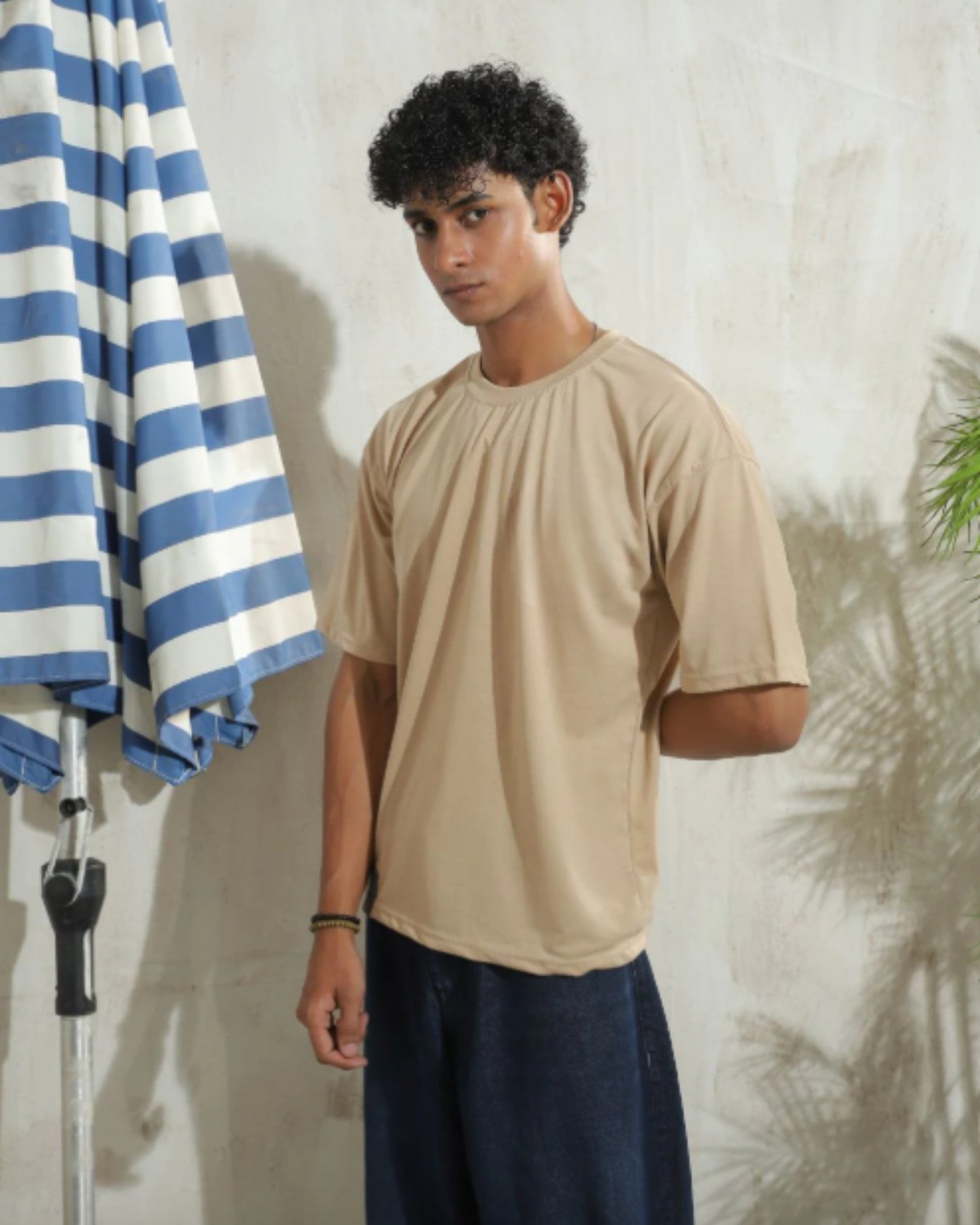Men's oversized beige drop shoulder t-shirt with relaxed silhouette