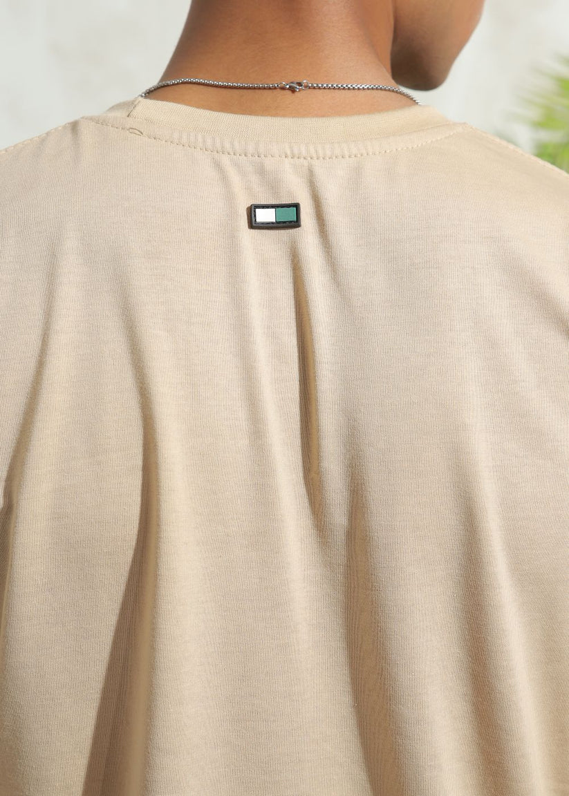 Men's oversized beige drop shoulder t-shirt with relaxed silhouette