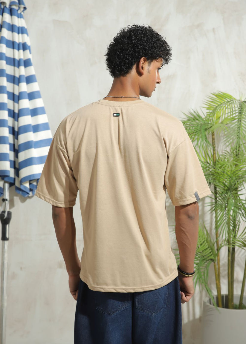 Men's oversized beige drop shoulder t-shirt with relaxed silhouette