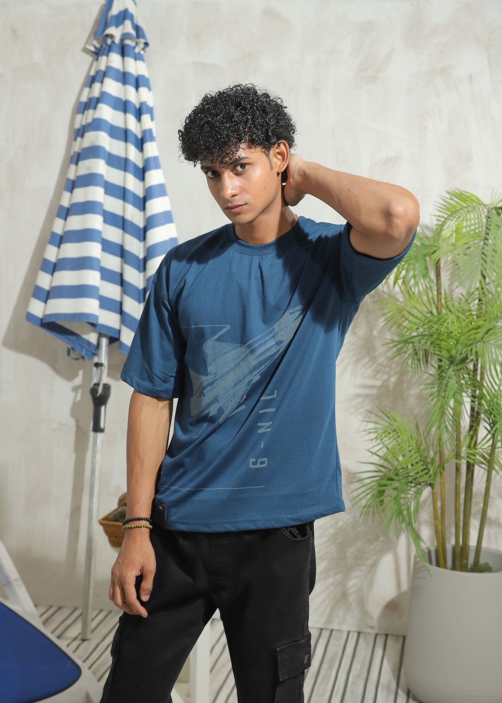 Men's oversized blue graphic t-shirt with drop shoulder fit