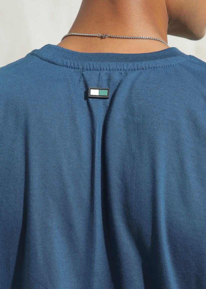 Men's oversized blue graphic t-shirt with drop shoulder fit
