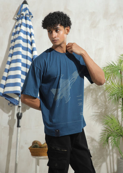 Men's oversized blue graphic t-shirt with drop shoulder fit