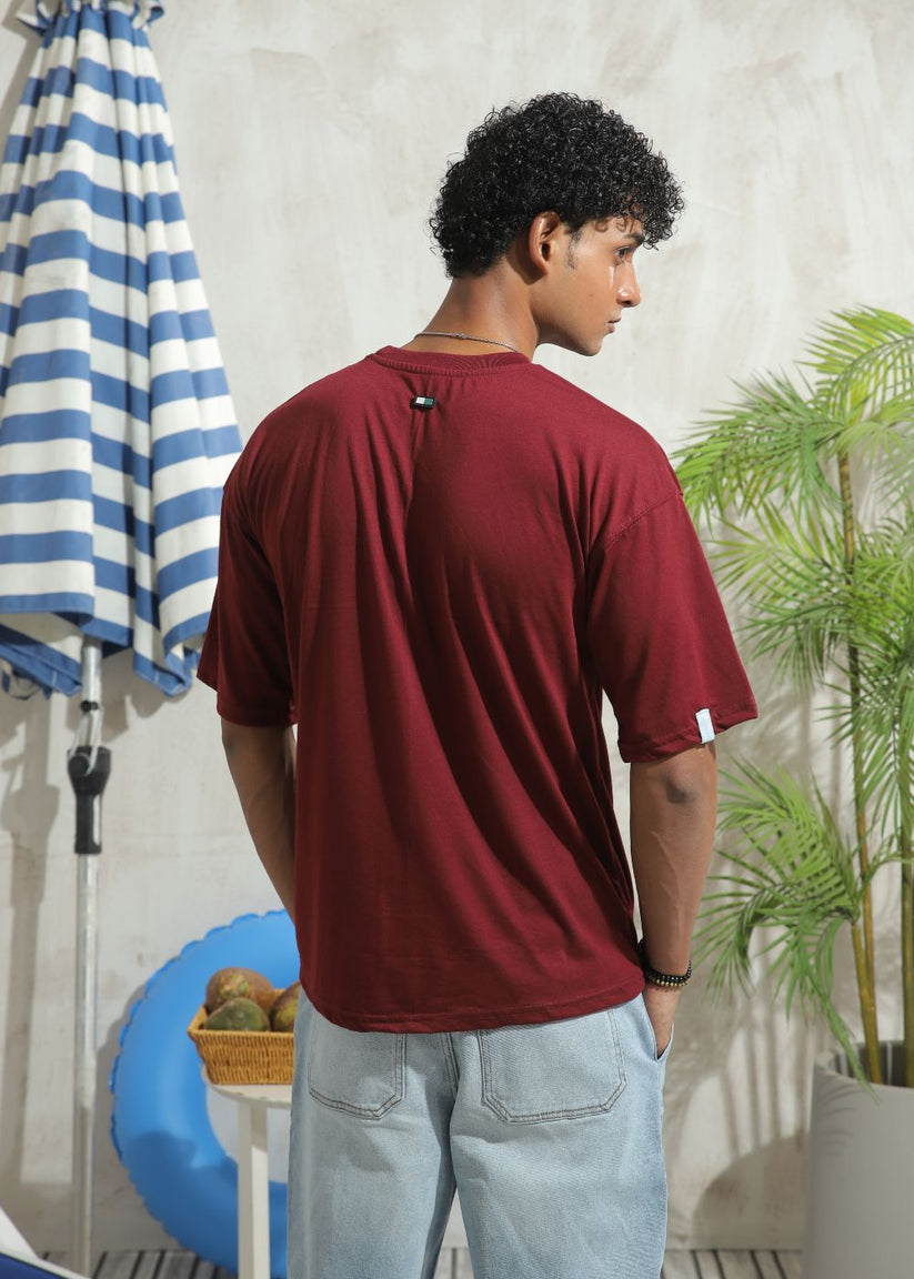 Men's oversized maroon drop shoulder t-shirt with relaxed fit