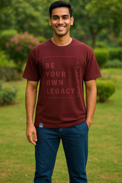 Men's oversized maroon graphic t-shirt with drop shoulder sleeves