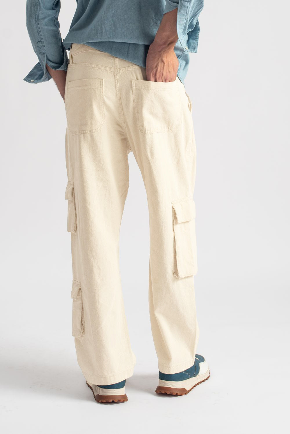 Men’s relaxed fit ivory cargo pants with three utility pockets