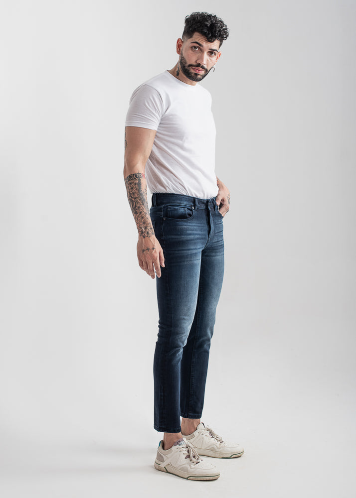Men's slim fit dark blue jeans with whiskered wash detailing