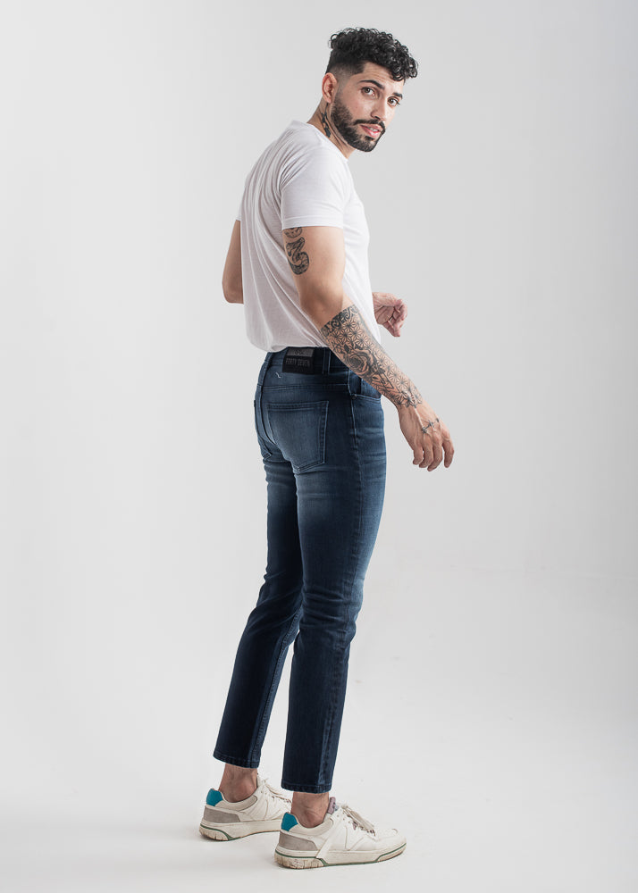 Men's slim fit dark blue jeans with whiskered wash detailing