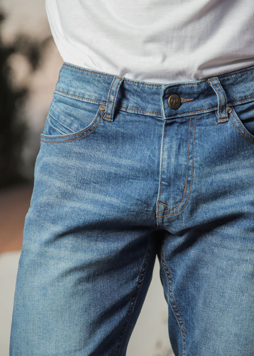 Men’s slim fit light blue jeans with tapered leg design