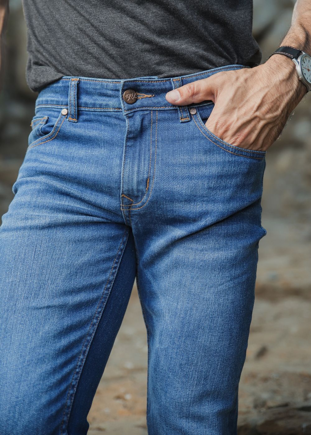 Men’s slim fit mid blue jeans with faded wash detailing
