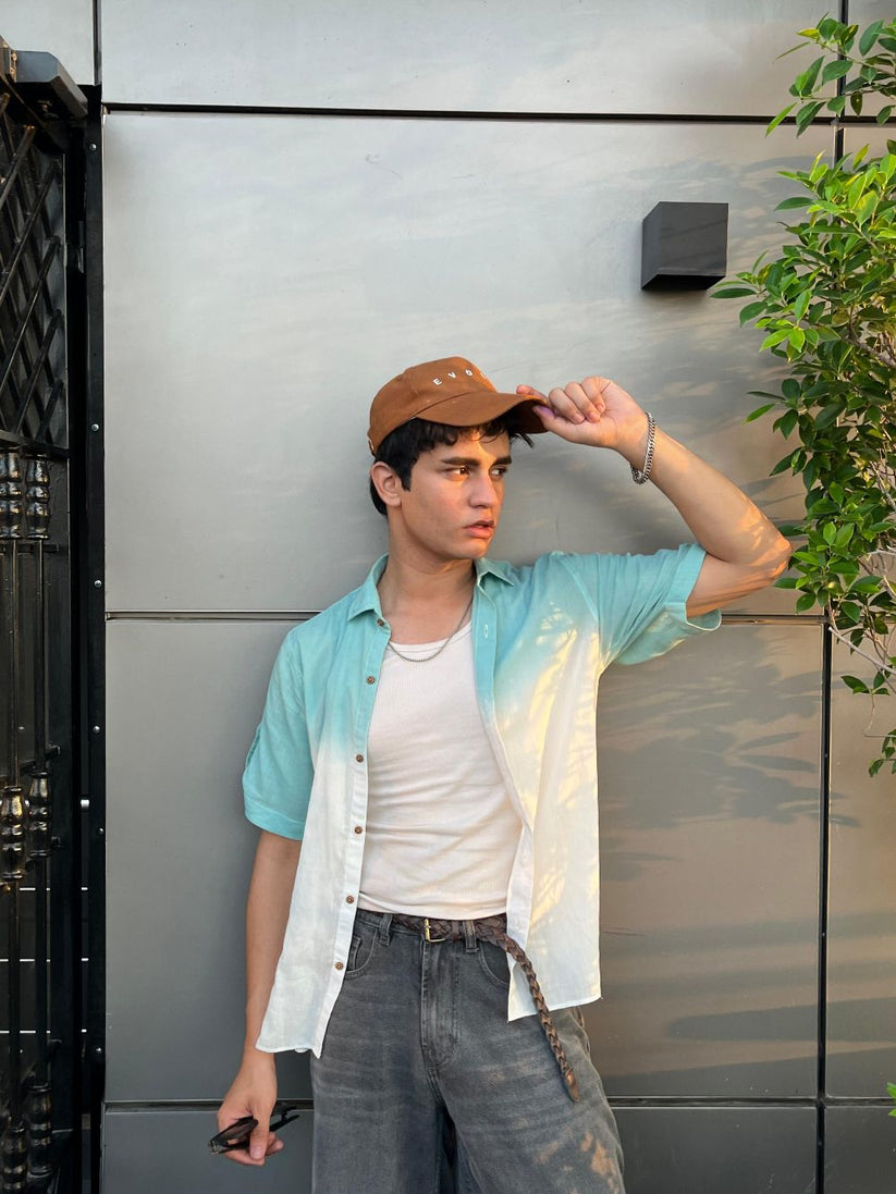 Men's teal half sleeve summer shirt with relaxed fit and resort collar