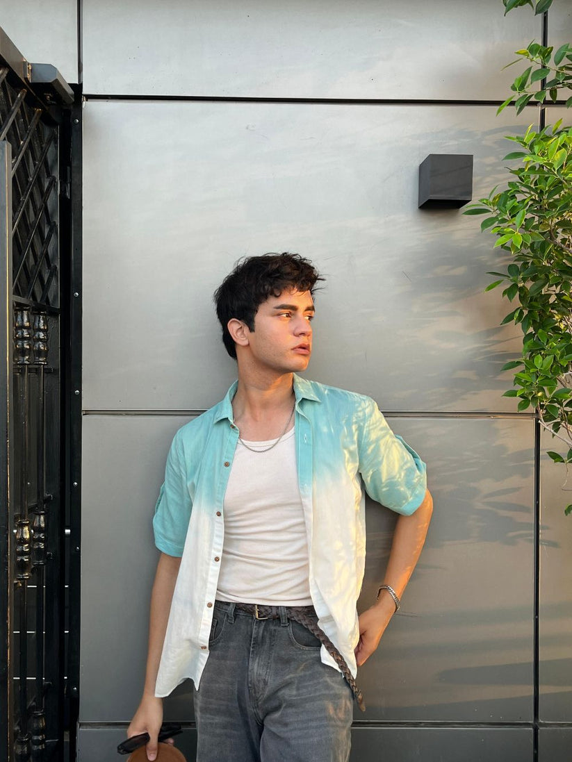 Men's teal half sleeve summer shirt with relaxed fit and resort collar