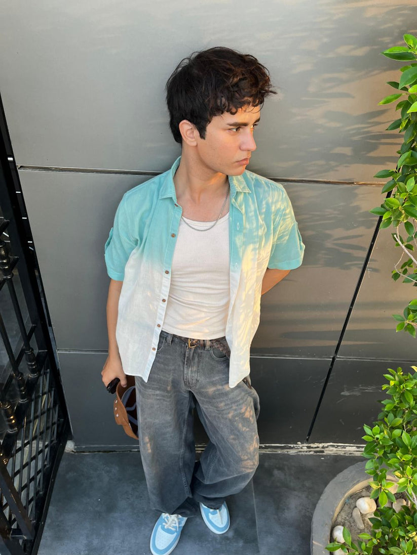 Men's teal half sleeve summer shirt with relaxed fit and resort collar