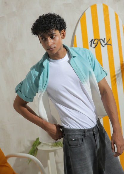 Men's teal half sleeve summer shirt with relaxed fit and resort collar