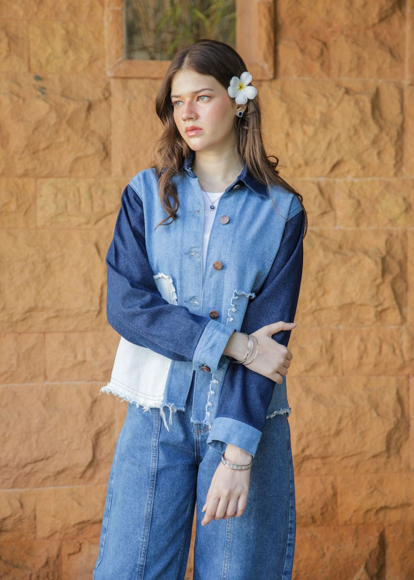Women's blue denim jacket with patches