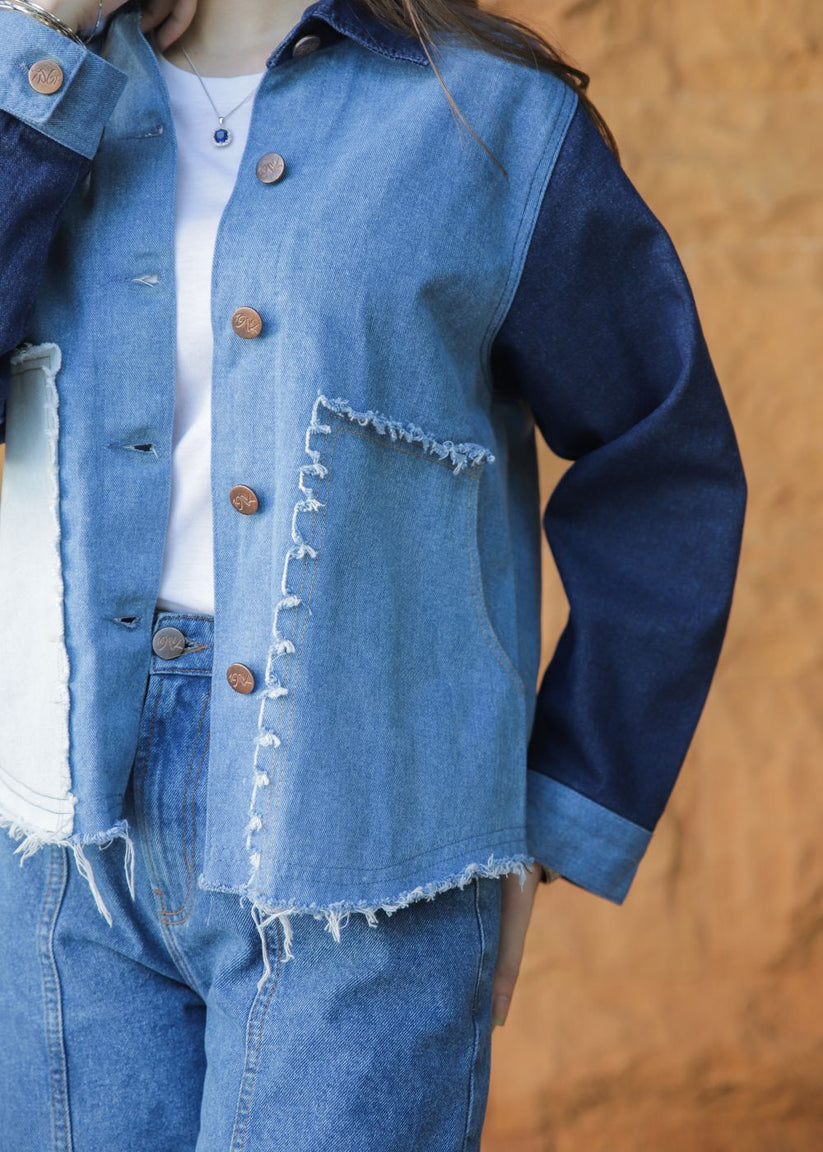 Women's blue denim jacket with patches