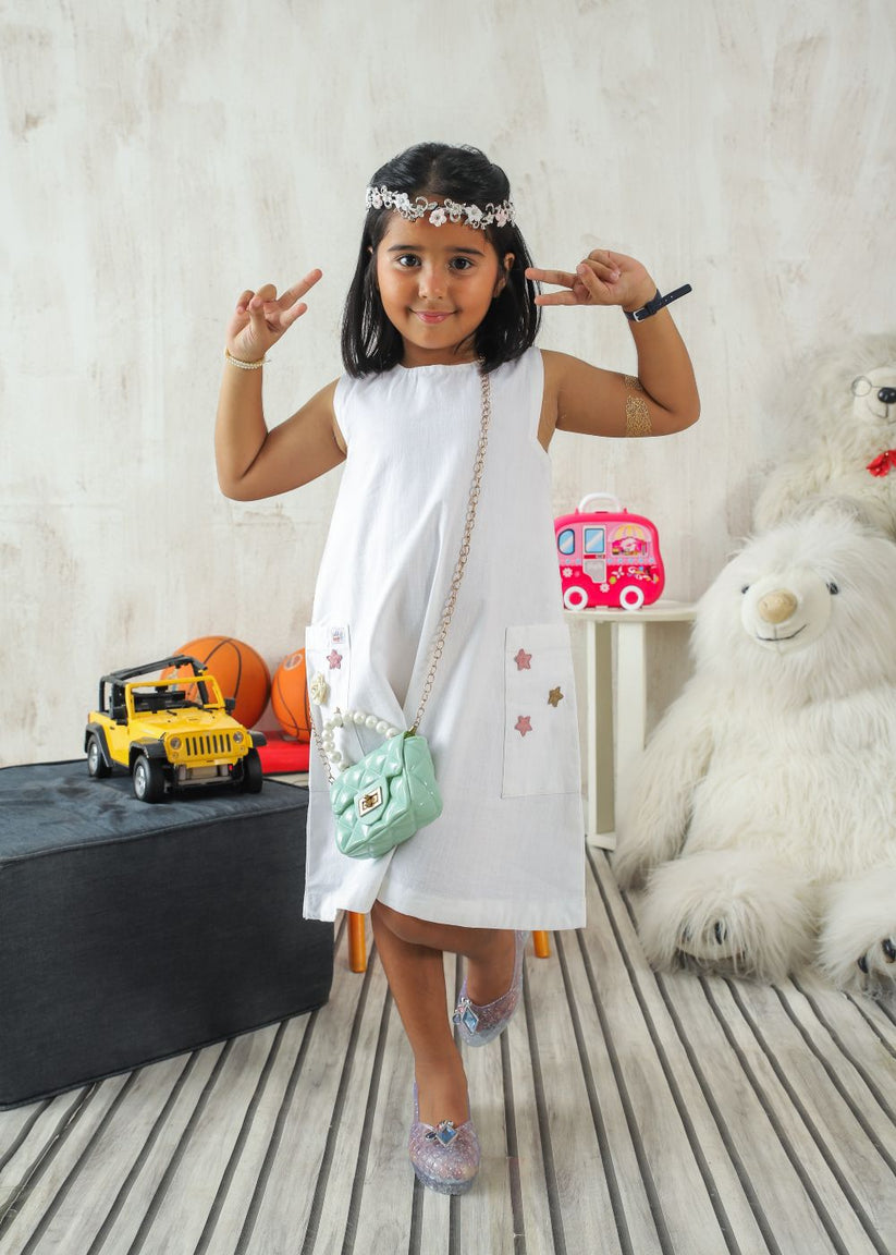 Girl's White Dress made of Cotton Lawn with Flower Details and Handy Side Pockets