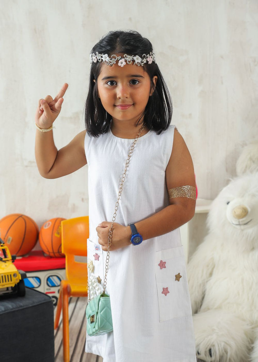 Girl's White Dress made of Cotton Lawn with Flower Details and Handy Side Pockets