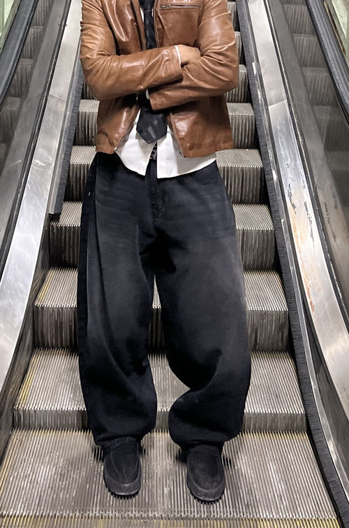 Men’s oversized fit black wide leg jeans with flowy silhouette