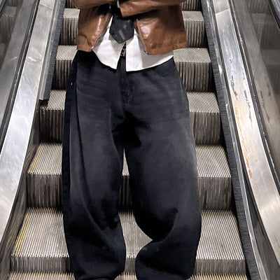 Men’s oversized fit black wide leg jeans with flowy silhouette