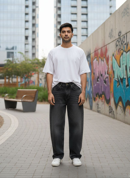 Men’s oversized fit black wide leg jeans with flowy silhouette