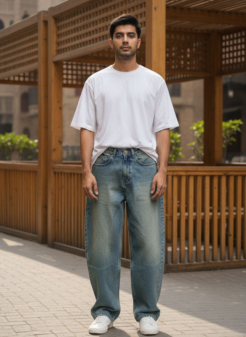 Men’s relaxed fit blue jeans with faded wash effect