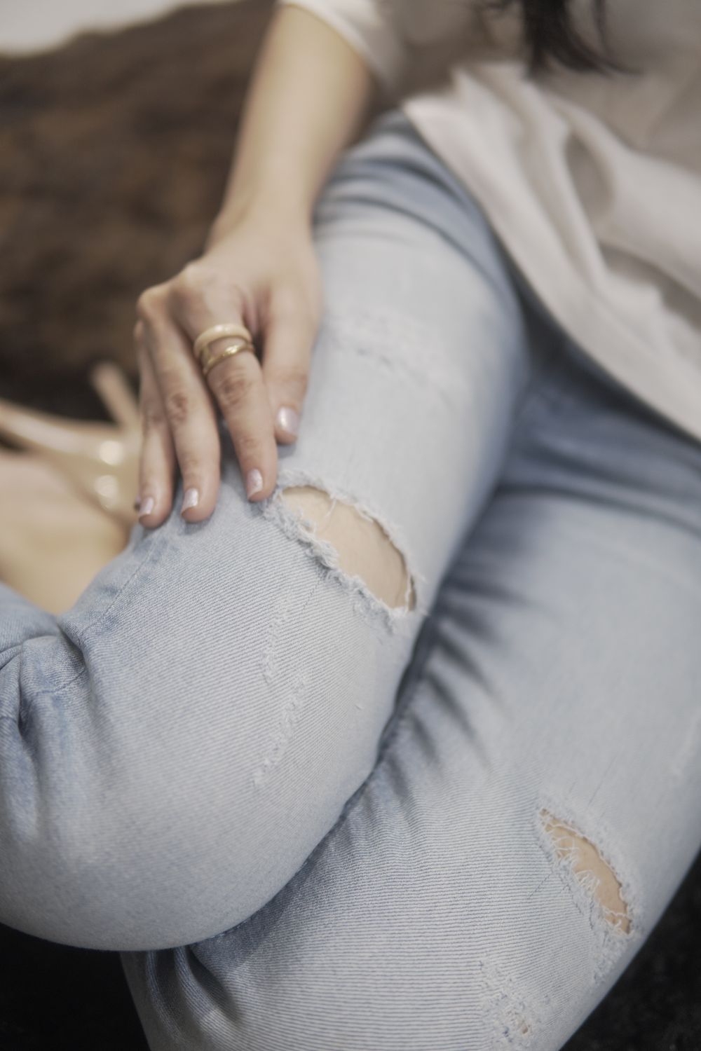 Women's Skinny Ripped Jeans in Light Blue Wash Featuring a Zipper Fly and Handmade Ripped and Repaired Abrasions