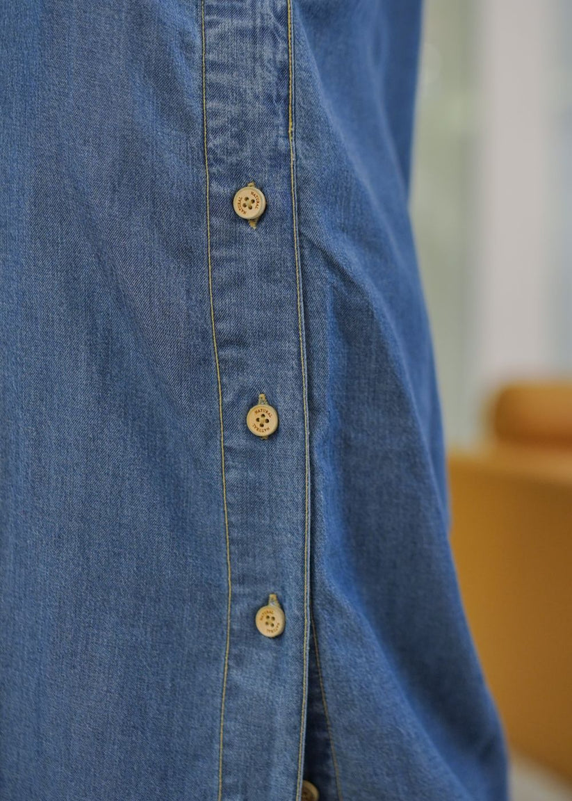 Women's long blue kurta with an open button design