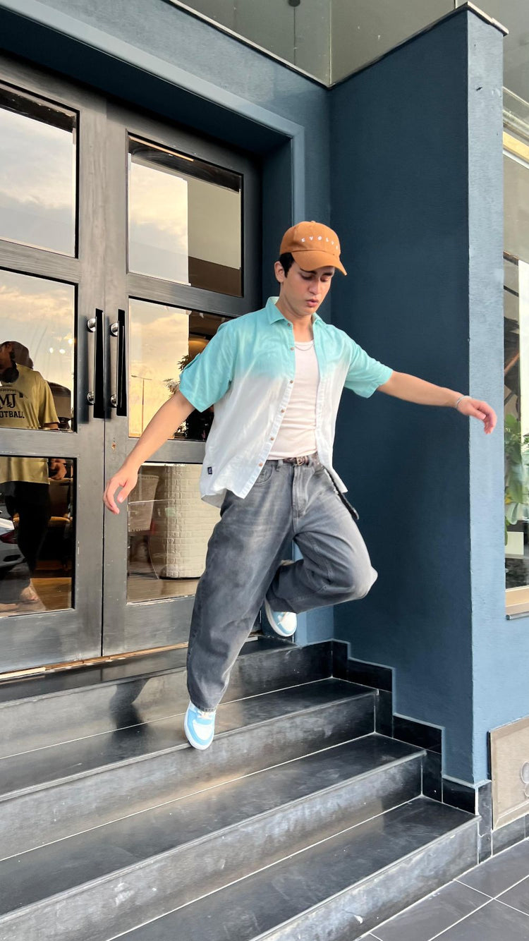 Men’s relaxed fit charcoal grey wide leg jeans with minimal detailing