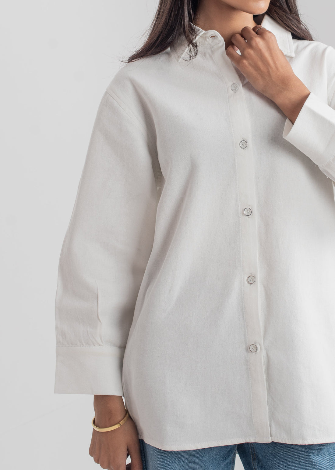 Women's Denim Button Down Shirt in White with a Collared Neckline and Buttons Down the Front