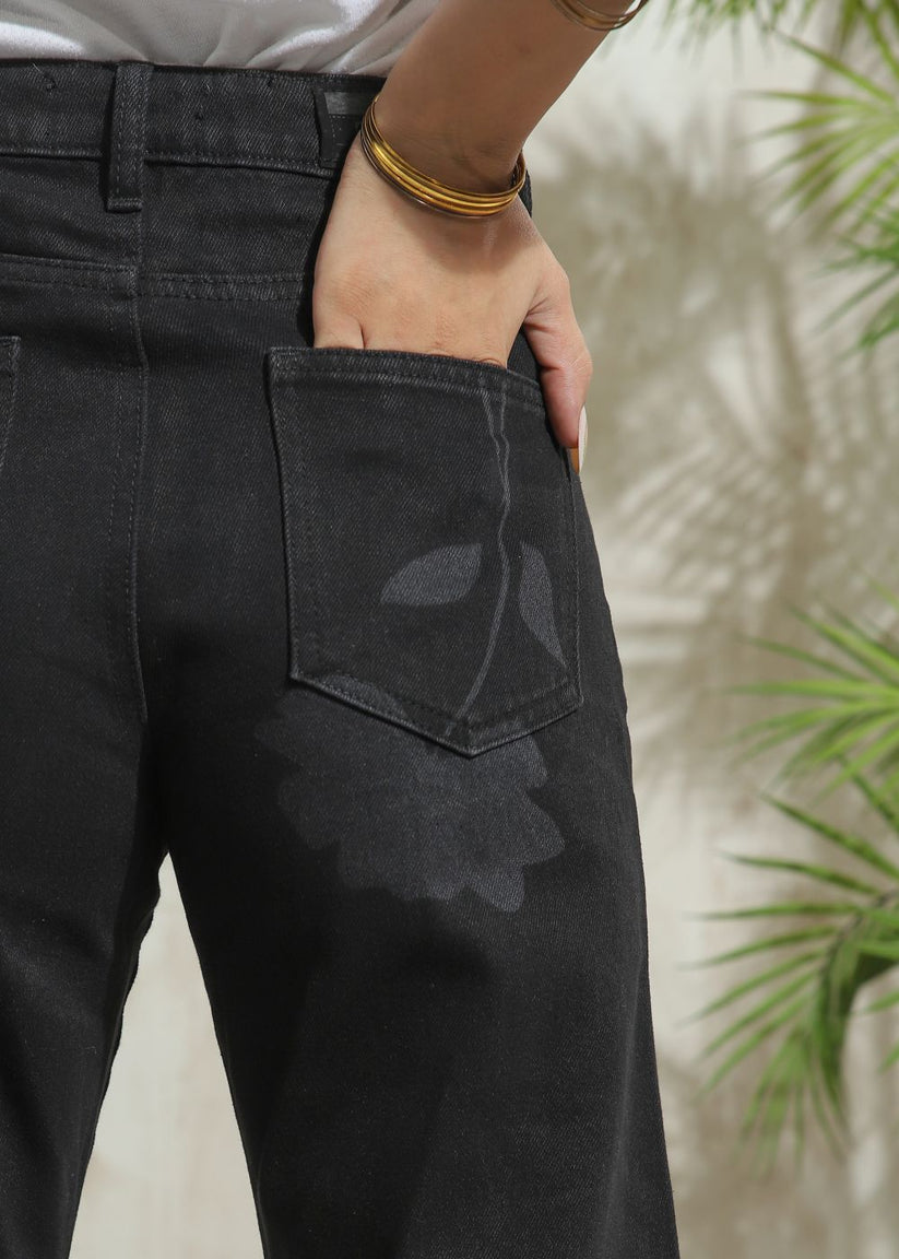 Women's Flare Jeans in Graphic Black with laser-printed designs