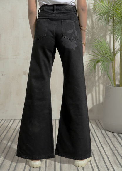 Women's Flare Jeans in Graphic Black with laser-printed designs