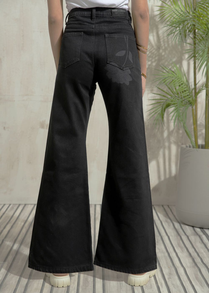 Women's Flare Jeans in Graphic Black with laser-printed designs