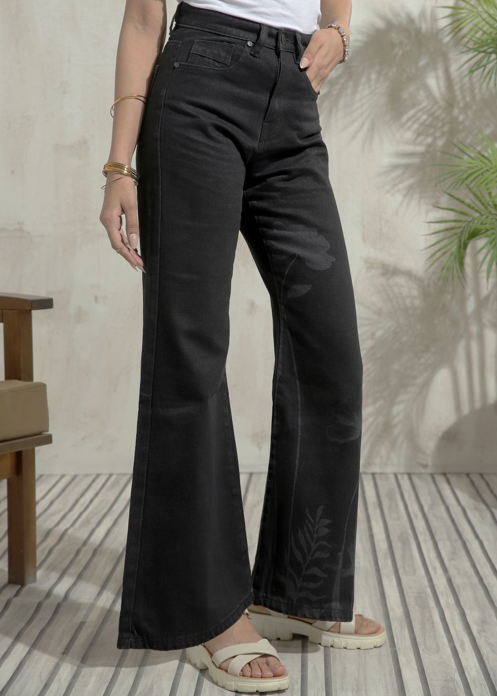 Women's Flare Jeans in Graphic Black with laser-printed designs