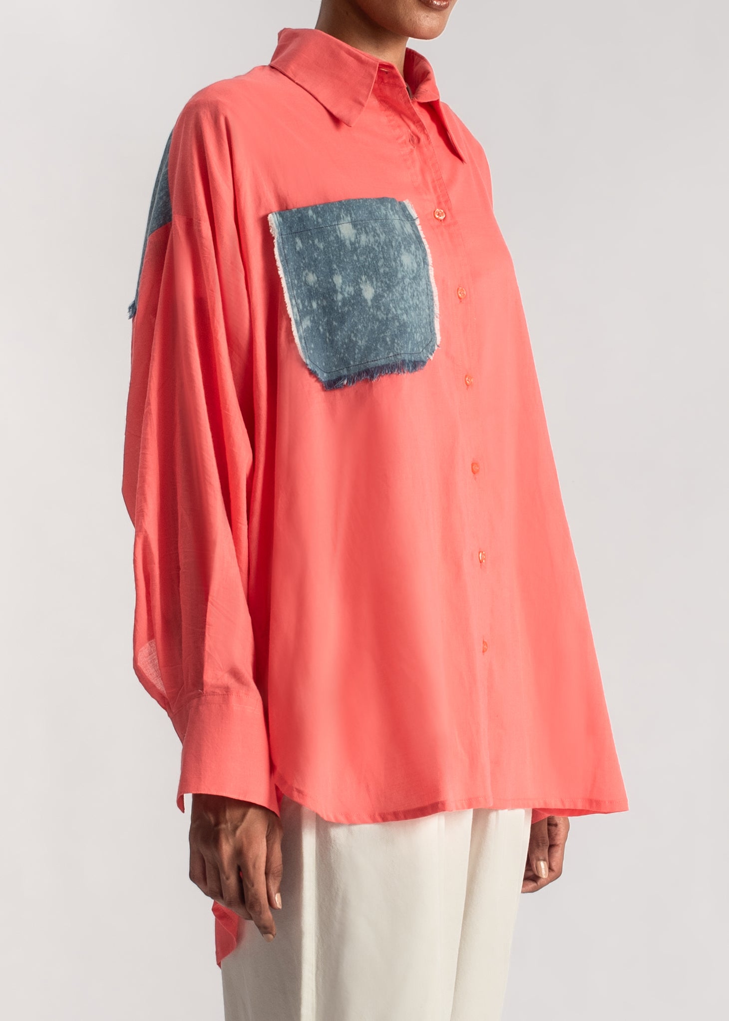 Women's Button Down Shirt in Orange with a frayed Denim Pocket and Back Patch