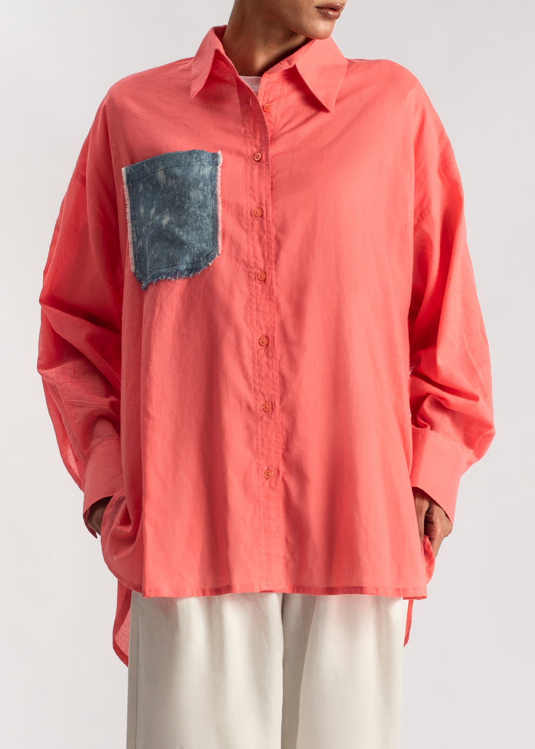 Women's Button Down Shirt in Orange with a frayed Denim Pocket and Back Patch