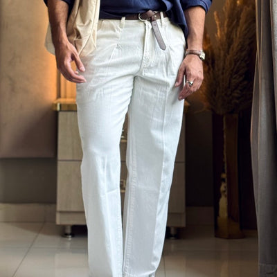 Ivory pleated relaxed jeans men loose fit tailored look smart casual outfit indoor styling