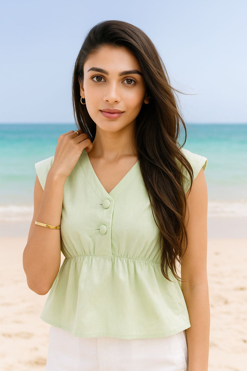 Ladies Peplum Top in Pastel Green