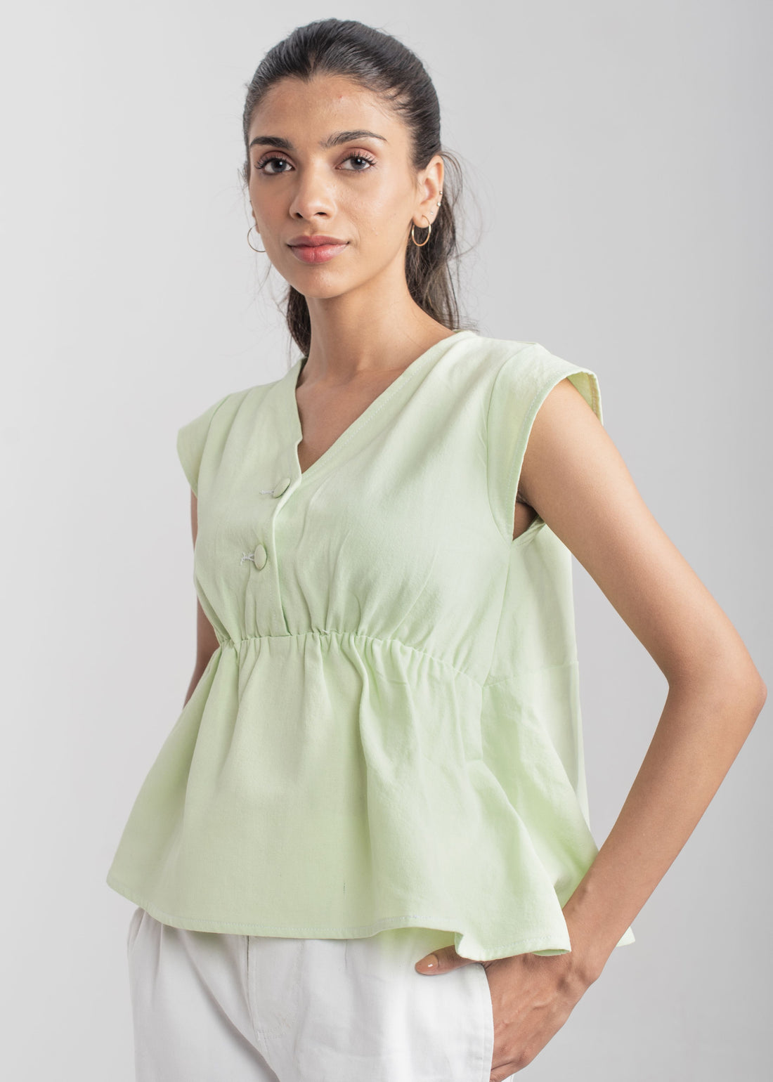Ladies Peplum Top in Pastel Green